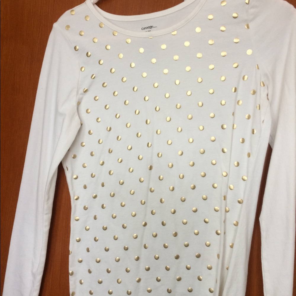 White top with gold polka dots